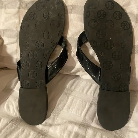 Tory Burch Black Flip Flops with Gold Medallion - Picture 2 of 3
